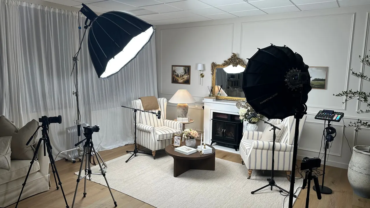 Mae Visuals podcast studio with recording microphones and cameras